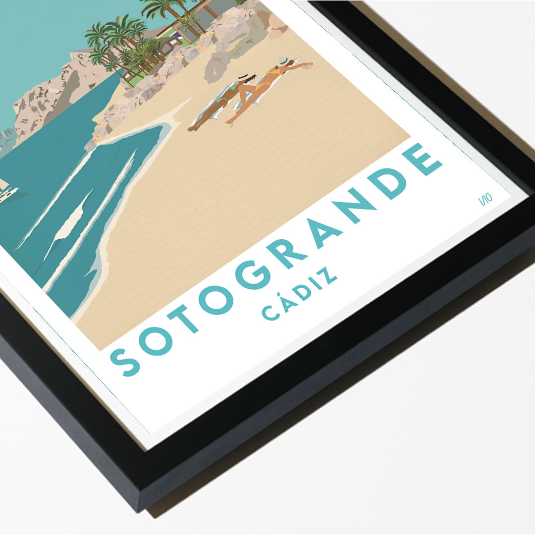 Framed artwork of a beach scene with 'Sotogrande Cádiz' text