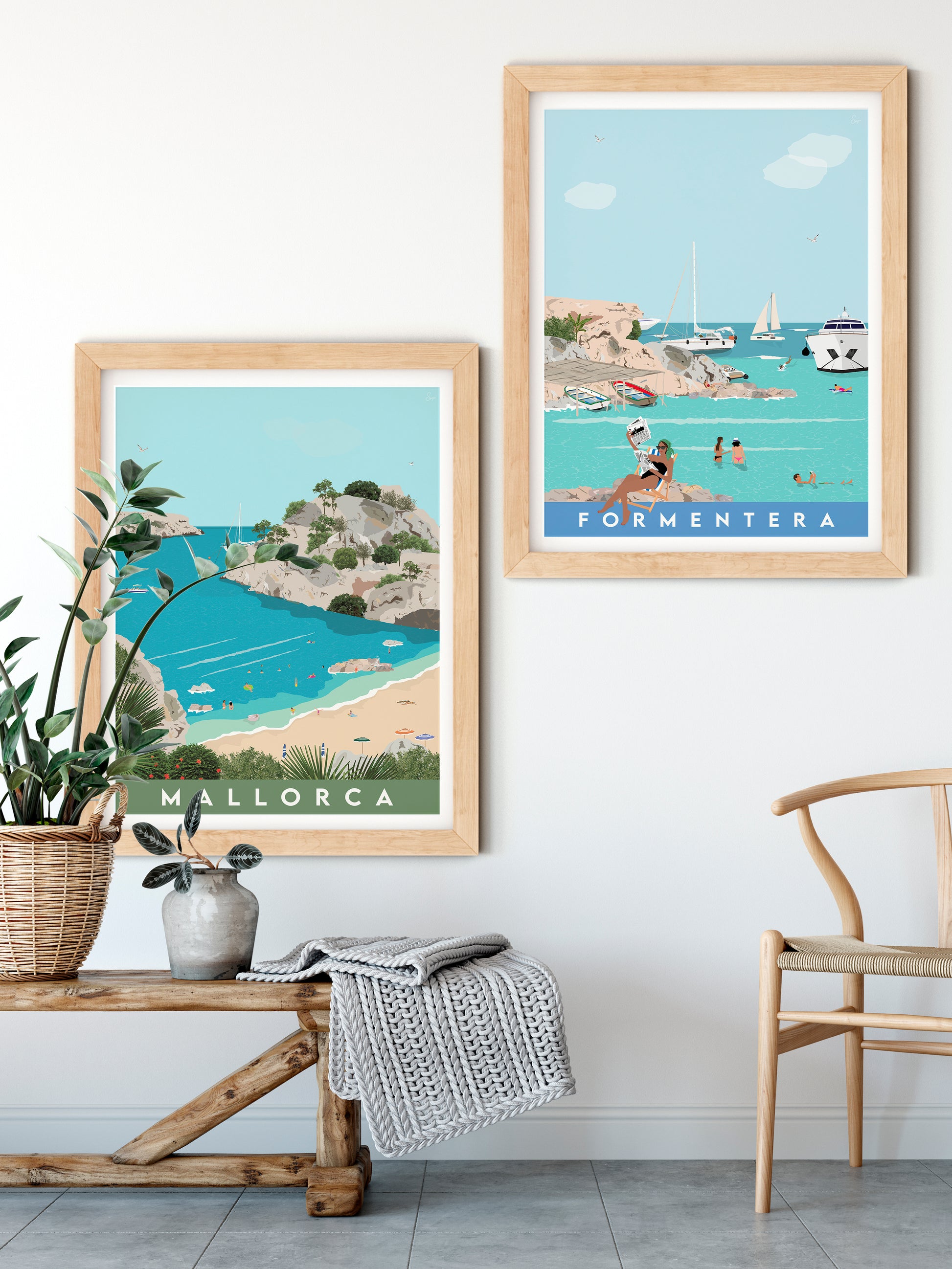 Two framed posters of Mallorca and Formentera on a wall with a wooden bench and chair.