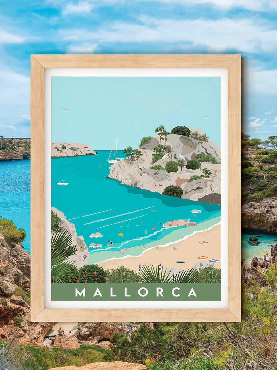 Framed artwork of a coastal scene with 'Mallorca' text, set against a scenic backdrop.